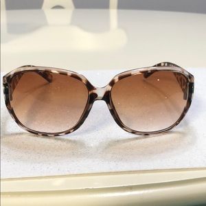 A beautiful pair of sunglasses large frames